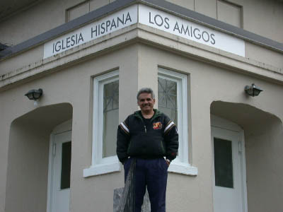 Pastor Angel Diaz in front of Newberg Church